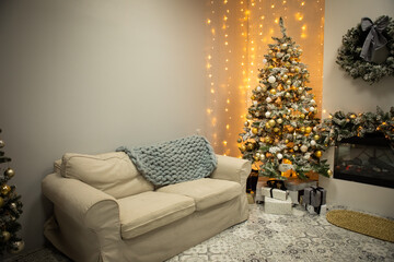 New Year background. Christmas room interior. Home interior with Christmas tree and sofa