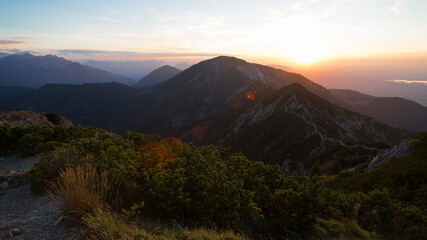Obraz na płótnie Canvas Sunset mountain panorama view from Heimgarten mountain in Bavaria, Germany