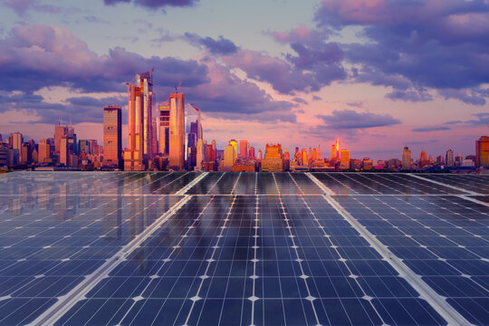 Solar panel over cityscapes, solar power green energy for life concept,New York City USA,