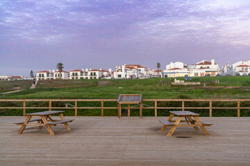 the scenic viewpoint on the Alentejo coast with the town of Porto Covo behind at sunset