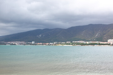 View of the city in the mountains from the sea