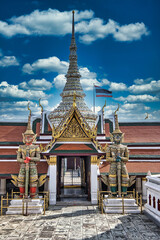 Fototapeta premium Grand Palace entrance in Bangkok Thailand with two giants at the front door as a symbol of protection