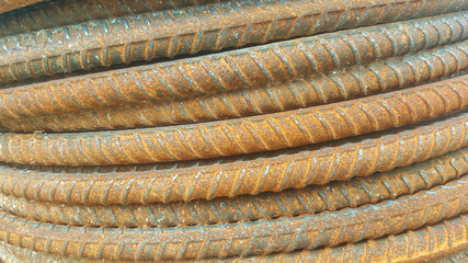 Stack of rusty iron rods or bars, 
rusty iron texture
