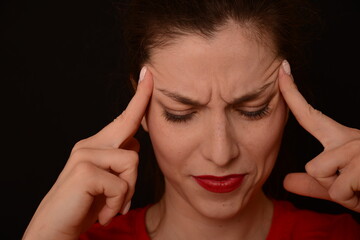a girl in a red footie 90 shows different emotions. smiling, angry, thoughtful, glad, happy tearing a T-shirt