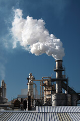 Factory smoke pipe sending smoke to the atmosphere.
