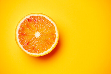 Single fresh raw clean isolated one alone red orange on the bright solid orange fond background