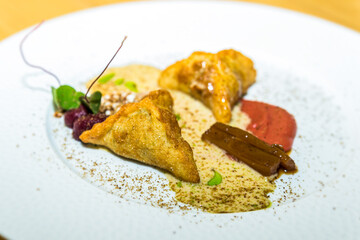 Fried fruit bags with pudding. Food styling and restaurant meal serving.