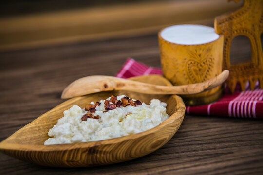 Slovak traditional food bryndzové halušky.Potato gnocchi dumplings with sheep cheese and bacon. The food in the restaurant. Food styling and restaurant meal serving.