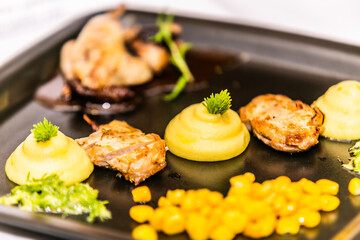 Close-up of modern styling food on a plate. The food in the restaurant. Food styling and restaurant meal serving.