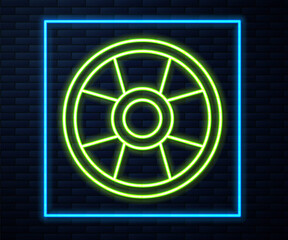 Glowing neon line Casino chip icon isolated on brick wall background. Casino gambling. Vector.