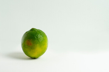 Close up fresh lime isolated on white background