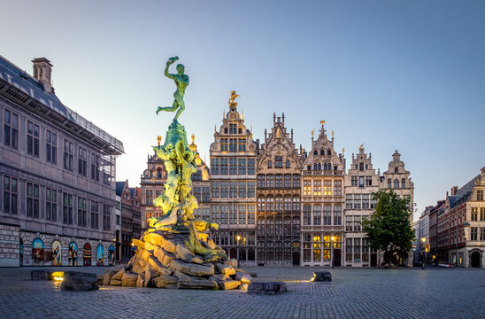 Brabo fountain on the 'Grote Markt' Square of Antwerp after sunset.