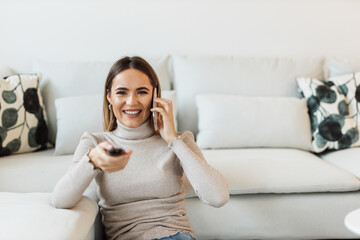 Watching movie while having phone call.