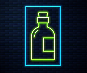 Glowing neon line Alcohol drink Rum bottle icon isolated on brick wall background. Vector.