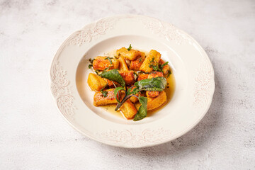 Potato gnocchi with brown butter and sage