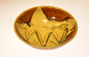 antique porcelain bowl with mountains figure in showed in the museum in Shanghai