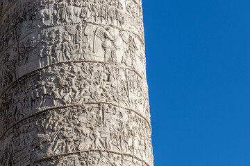 Close-up of the Trajan Column, Roman triumphal monument built by Emperor Trajan to celebrate the...
