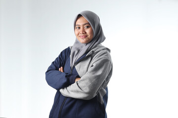 portrait of an Asian woman wearing casual clothes. hooded woman wearing gray jacket isolated on white background