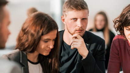 young business colleagues at a group meeting in the office