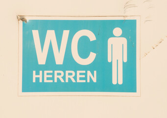 a toilet or WC sign