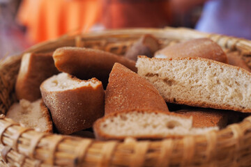 A full basket of baguettes symbolizes the abundance of food, highlighting the importance of carbohydrate-rich products and their role in nutrition.
