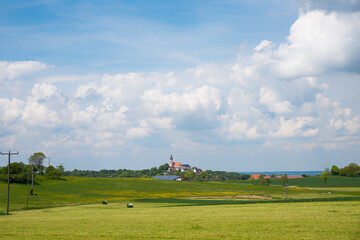 Fototapeta na wymiar agricultural fields round cloister Andechs, rural landscape upper bavaria in spring