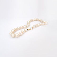 Pearl precious necklace isolated on white background