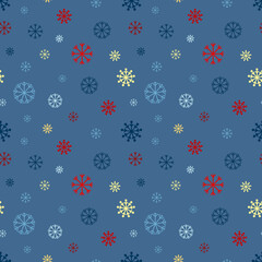 Seamless vector pattern with multi-colored snowflakes on a blue background. Vector illustration for new year and Christmas, packaging, gifts.