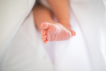 small child's bare foot. smooth, soft heels.