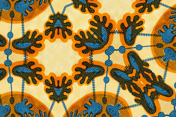 African fabric, cotton (textured, seamless) – Hands – Orange and blue colors, photo