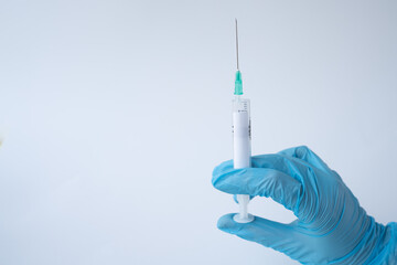 syringe close up. copy space for text. covid-19 vaccination. medicine, healthcare and pandemic...