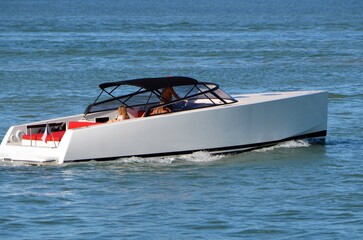Fototapeta premium High-end motor boat cruising slowly on the Florida Intra-Coastal Waterway.