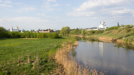 View of the Kamenka river and the domes of the Alexander and Pokrovsky monastery in Suzdal