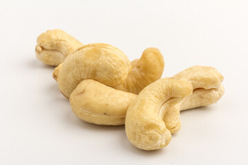 Raw cashew nuts isolated on white background.