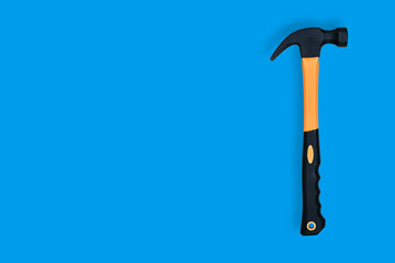 Hammer on a blue background. Hammer seamless pattern.