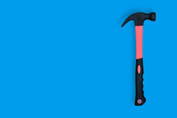 Hammer on a blue background. Hammer seamless pattern.