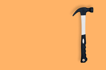 Hammer on an orange background. Hammer seamless pattern.