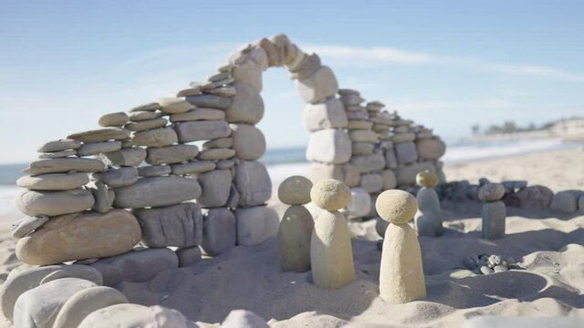 Christmas nativity scene stone sculpture on the beach 