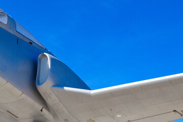 low-flying jet plane on a sunny day