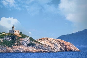 Fototapeta na wymiar the lighthouse of Skiathos, Skiathos island, Greece.