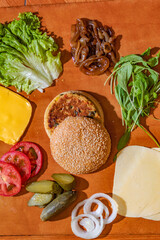 Obraz na płótnie Canvas high shot of ingredients for vegan burger