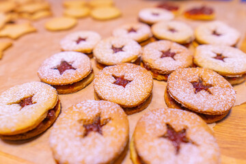 Freshly baked peanut butter cookies on cooling rack. Macro with extremely shallow dof. Selective focus limited to center of closest cookie.
