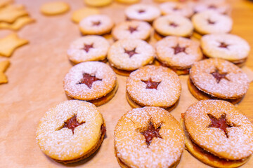 Freshly baked peanut butter cookies on cooling rack. Macro with extremely shallow dof. Selective focus limited to center of closest cookie.