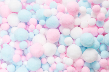White, pink and blue soft pompons.