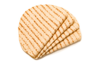 Grilled pitta bread isolated on white background.