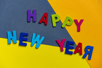 Happy new year font art colorful texting for greeting or celebrate card with colorful background, Sensitive Focus