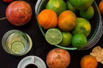 Citrus fruit background on a black cloth