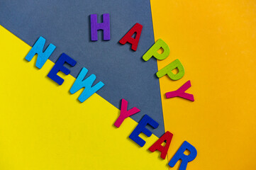 Happy new year font art colorful texting for greeting or celebrate card with colorful background, Sensitive Focus