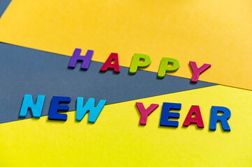 Happy new year font art colorful texting for greeting or celebrate card with colorful background, Sensitive Focus