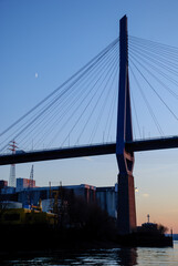 Fototapeta na wymiar Hamburg, Germany: Pylon of the Koehlbrand Bridge in Hamburg in the twilight
